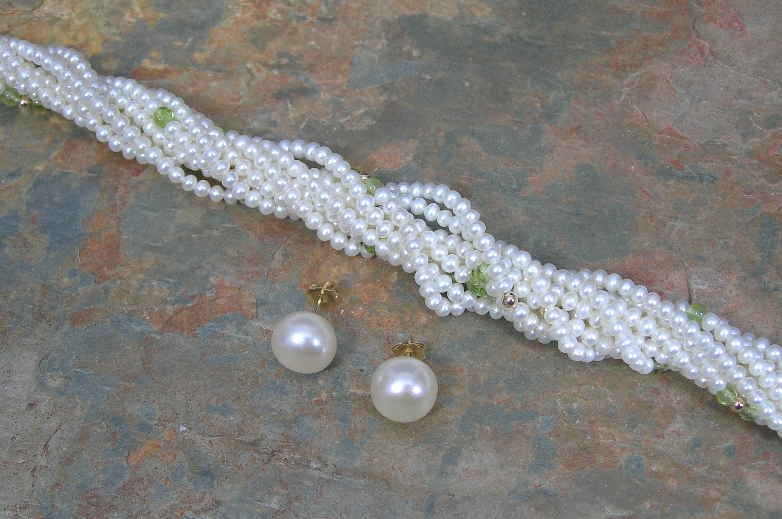 A multi-row pearl necklace,
