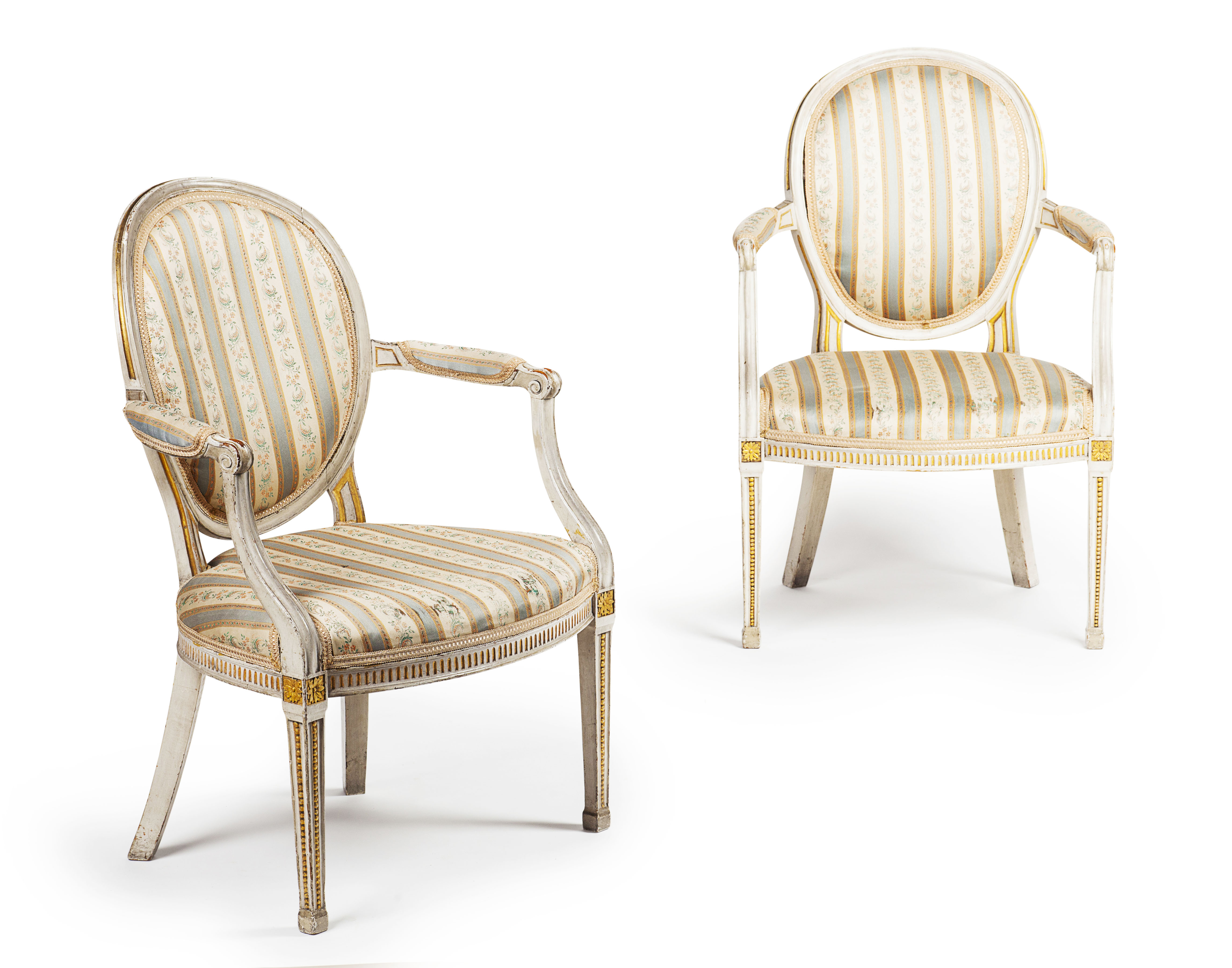 PAIR OF GEORGE III GREY PAINTED AND PARCEL GILT OPEN ARMCHAIRS