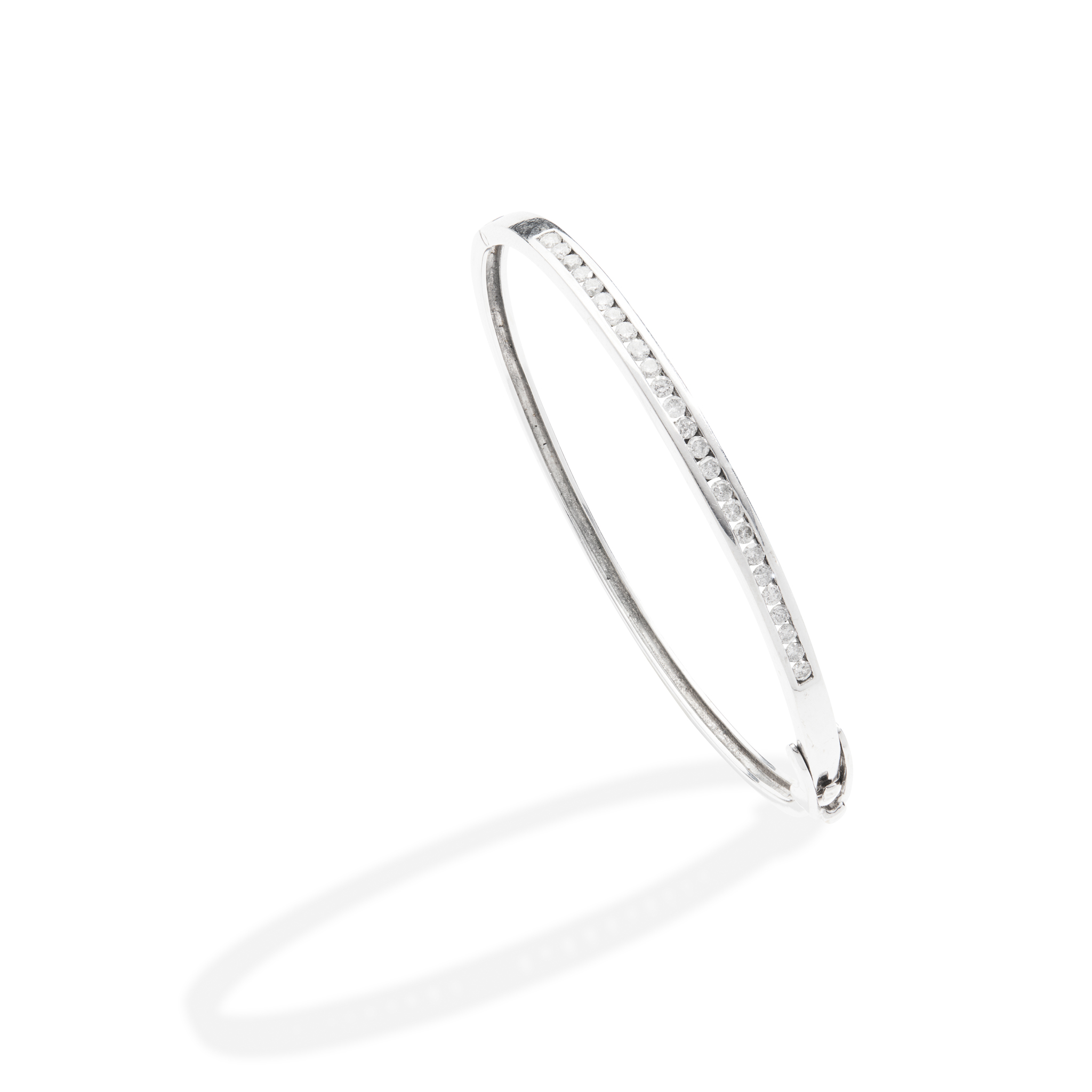 An 18ct gold diamond bangle