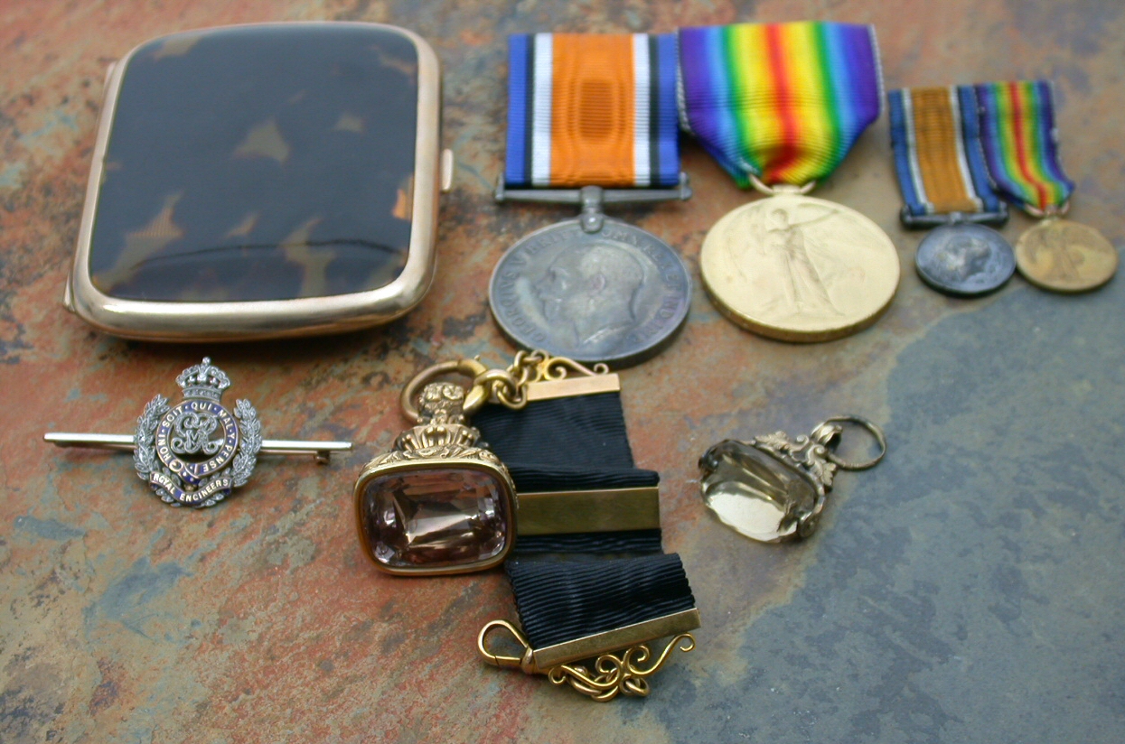 Royal Engineers - a rose cut diamond, red and blue enamelled bar brooch;