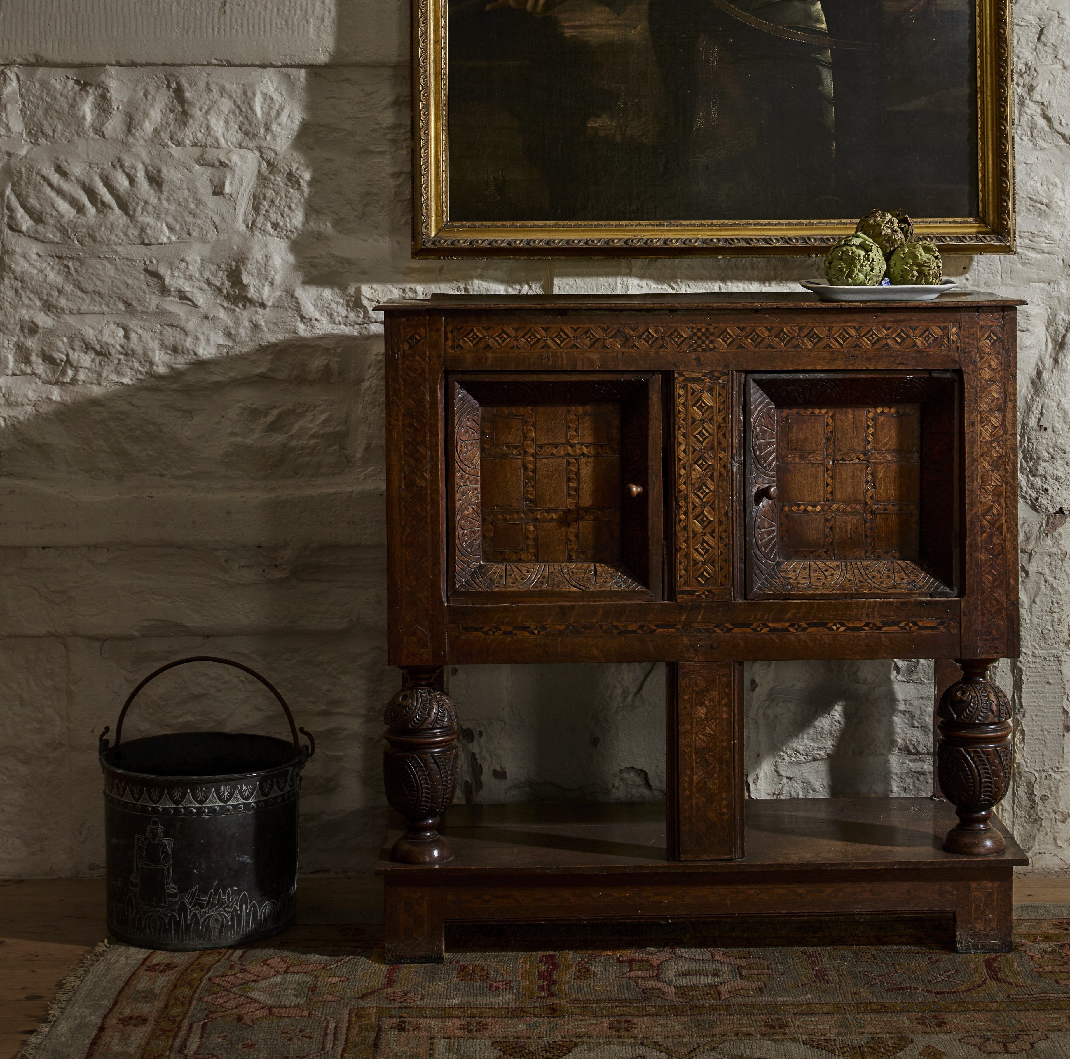 JAMES I OAK AND PARQUETRY LIVERY CUPBOARD