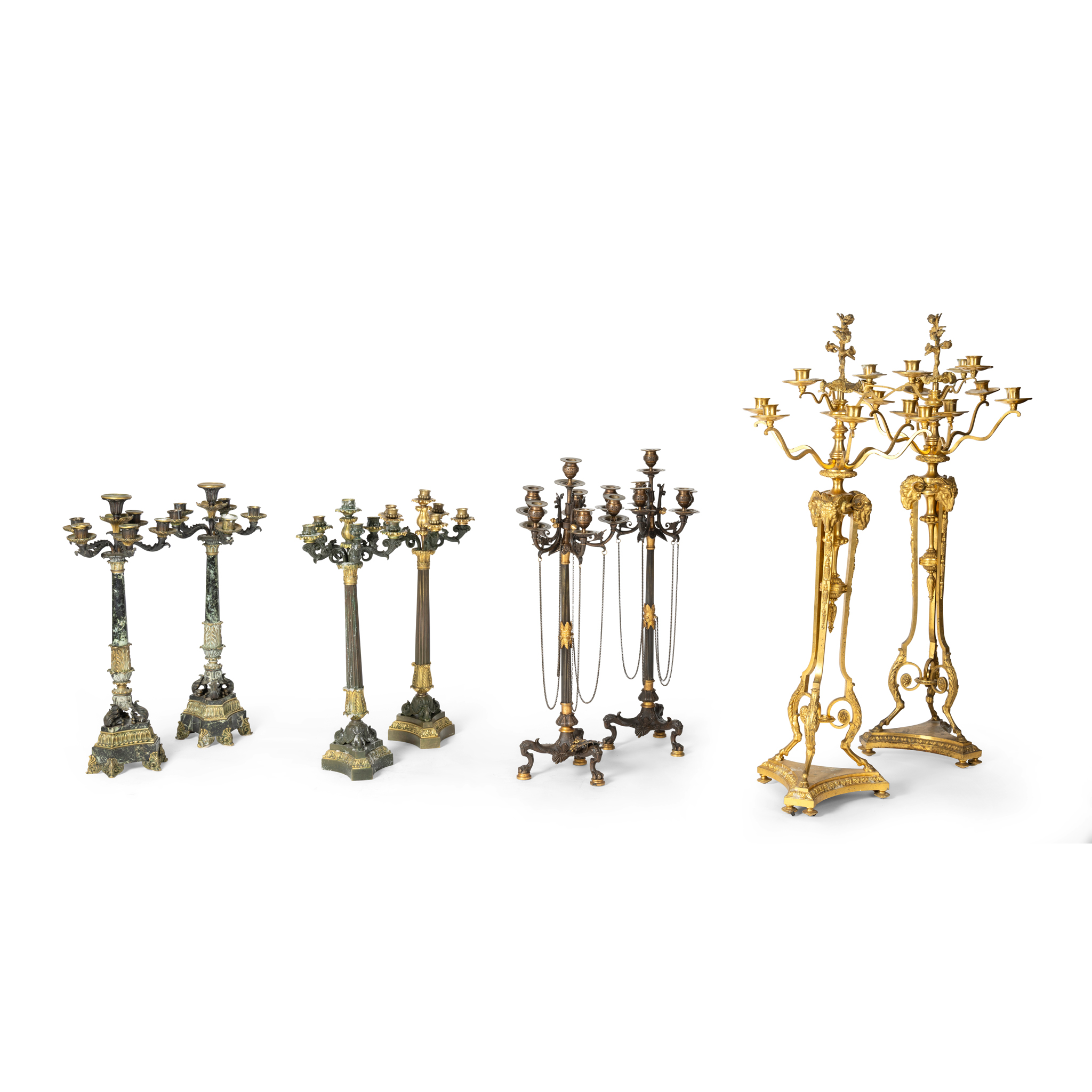 A PAIR OF MARBLE AND GILT METAL SIX LIGHT CANDELABRA