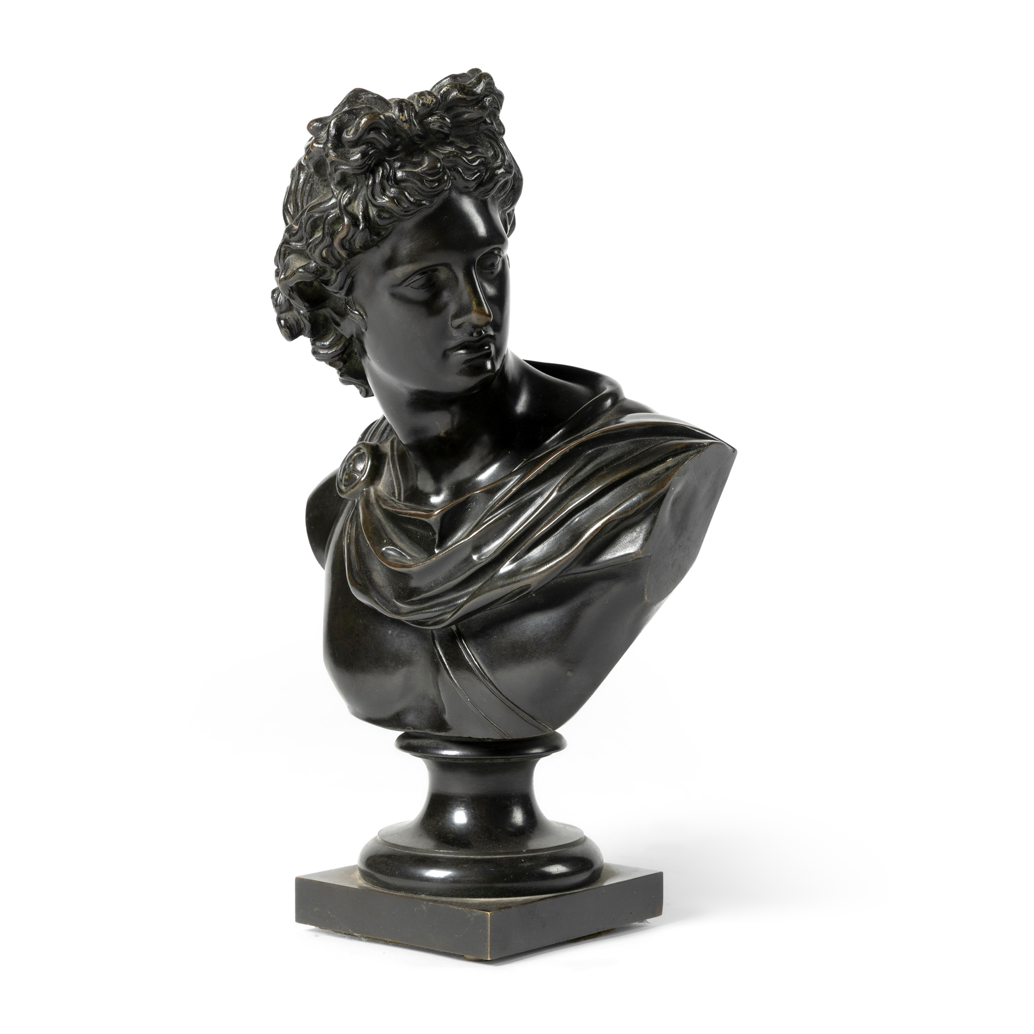 A BRONZE BUST OF THE APOLLO BELVEDERE, AFTER THE ANTIQUE