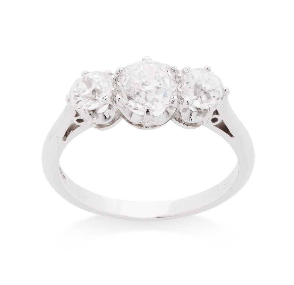 A three stone diamond set ring