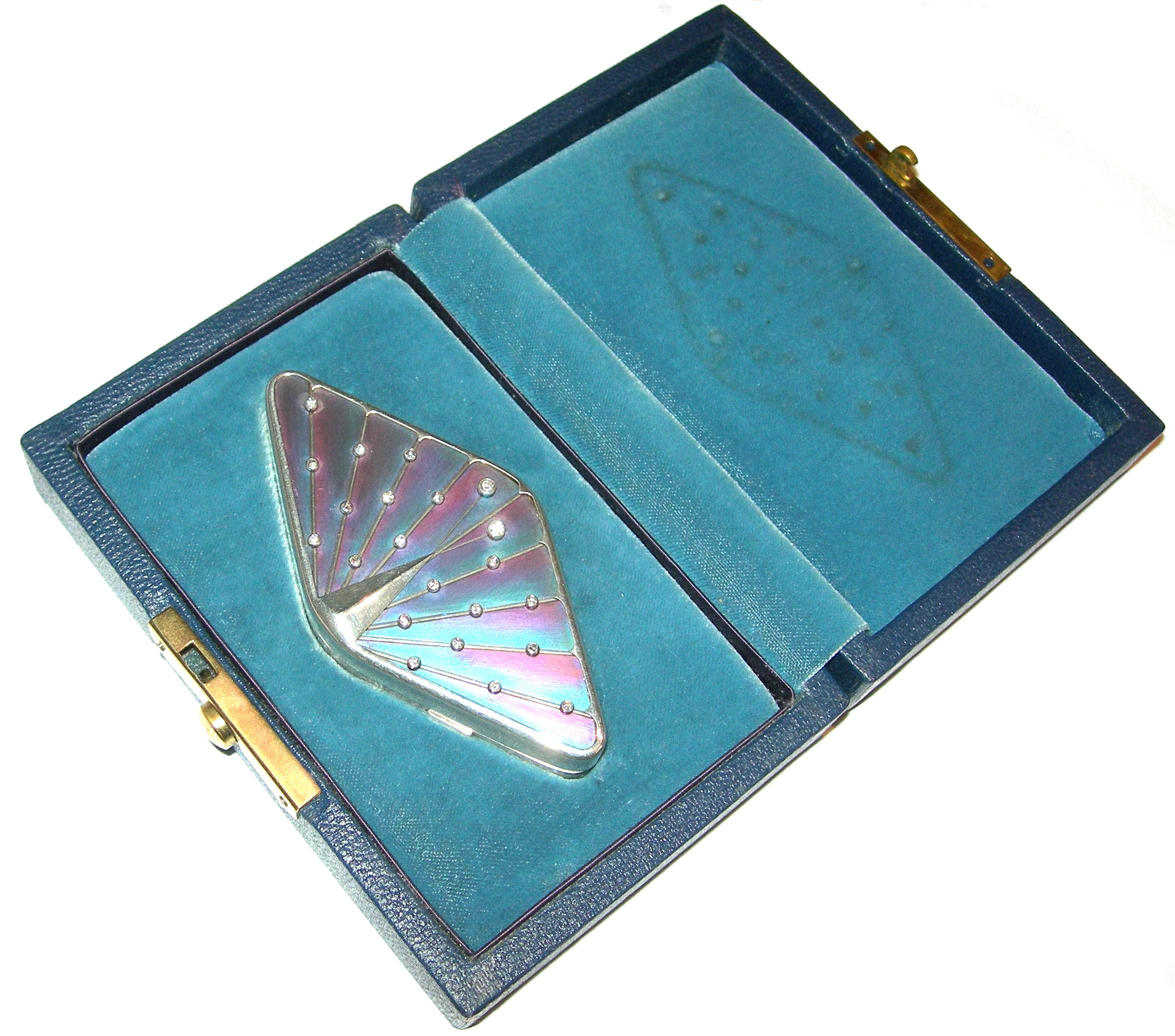 A diamond set compact,