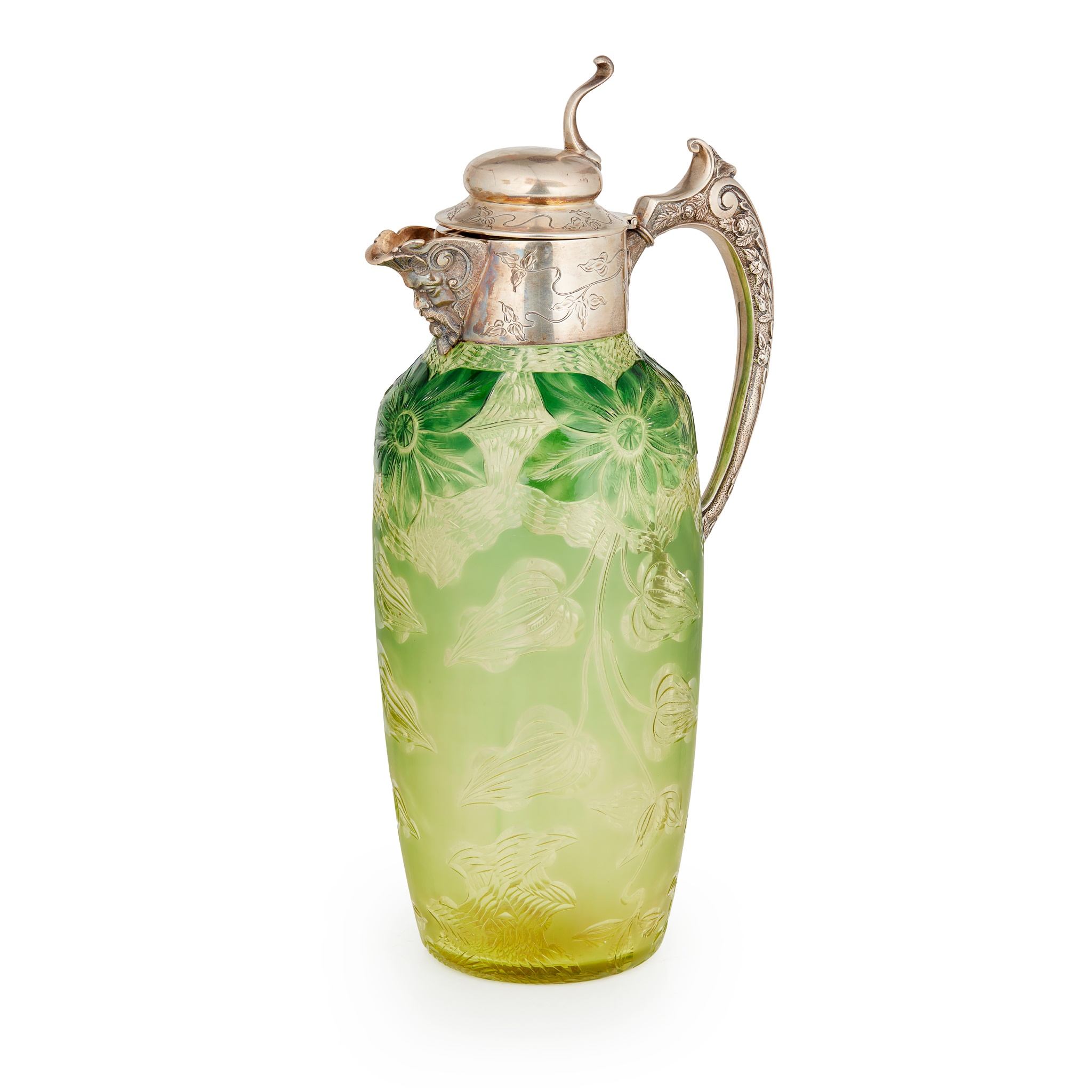 An Edwardian silver mounted Art Nouveau claret jug
