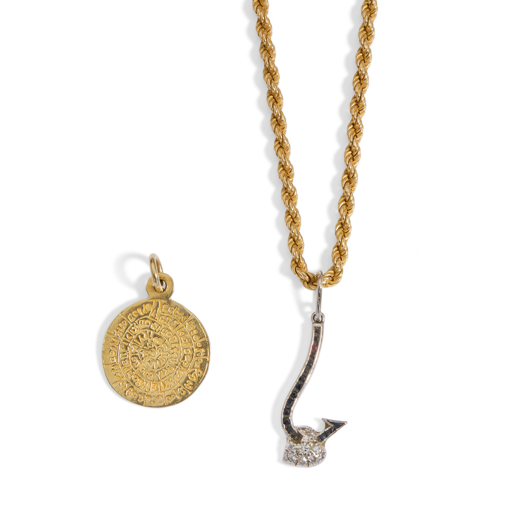 A sapphire and diamond pendant necklace and another pendant