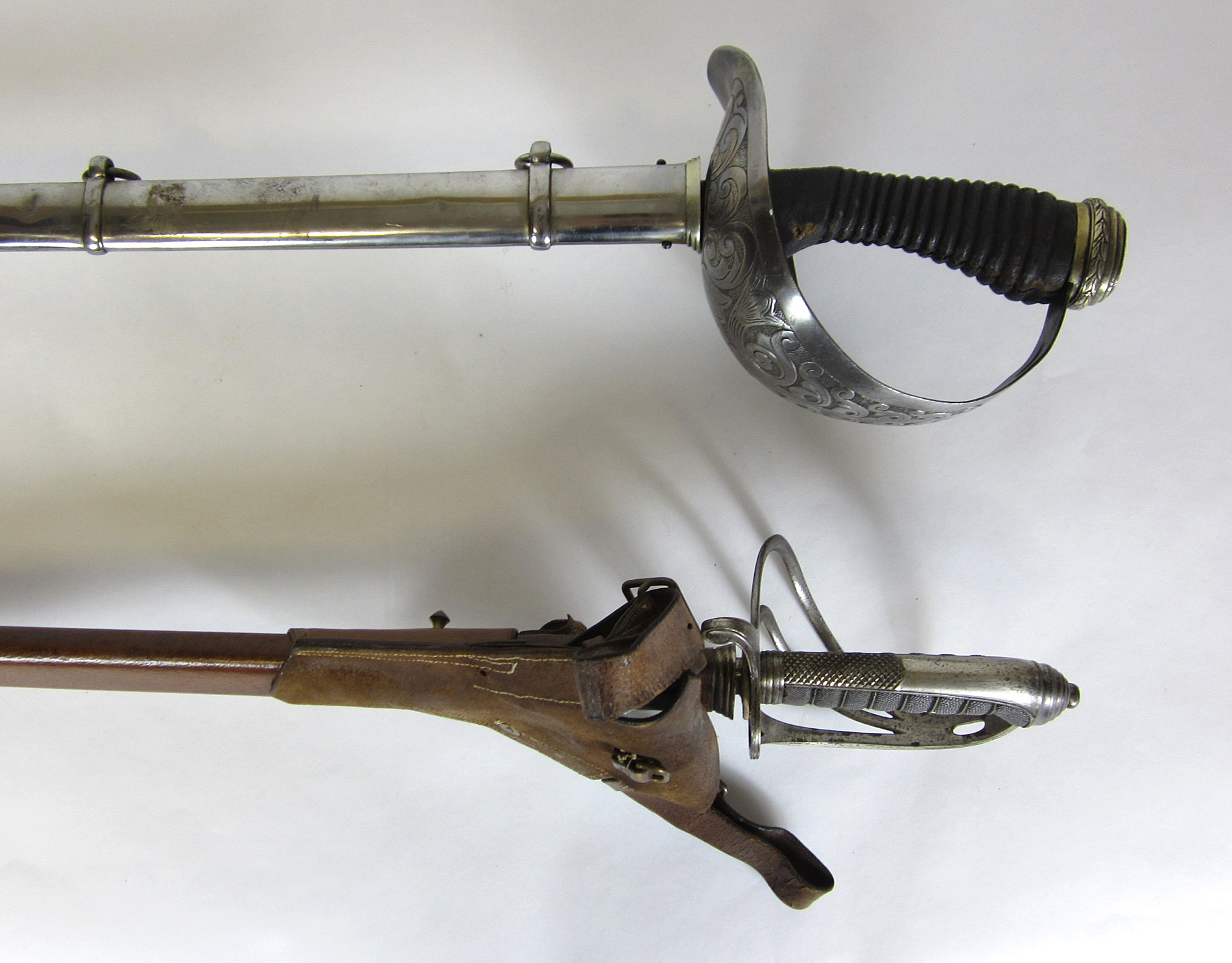 TWO CAVALRY OFFICERS SWORDS