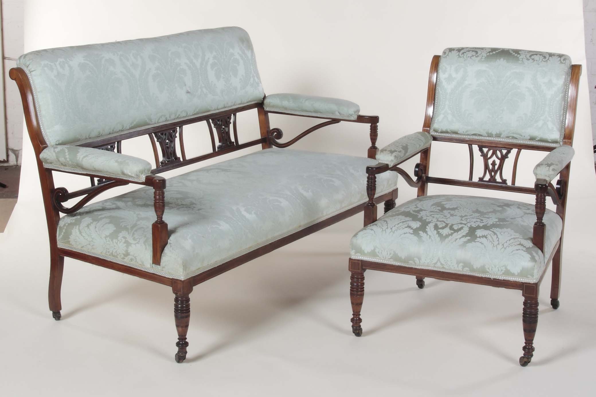 An Edwardian rosewood drawing room suite