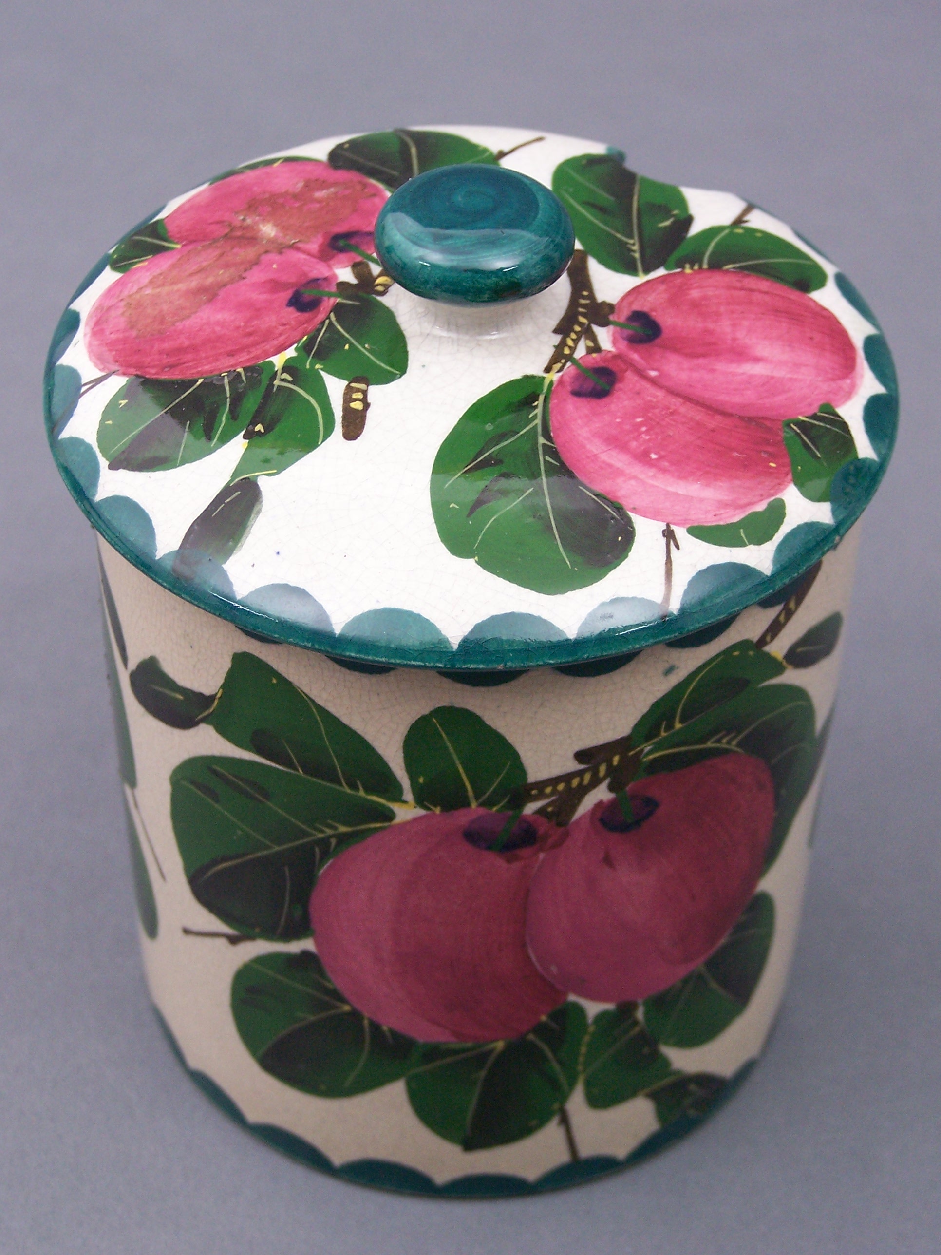 A Wemyss preserve jar and cover,