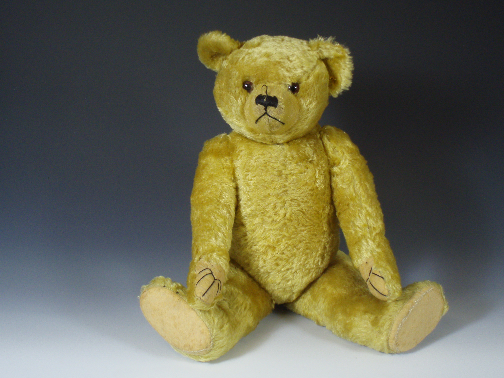 An early/mid 20th century teddy bear Probably English