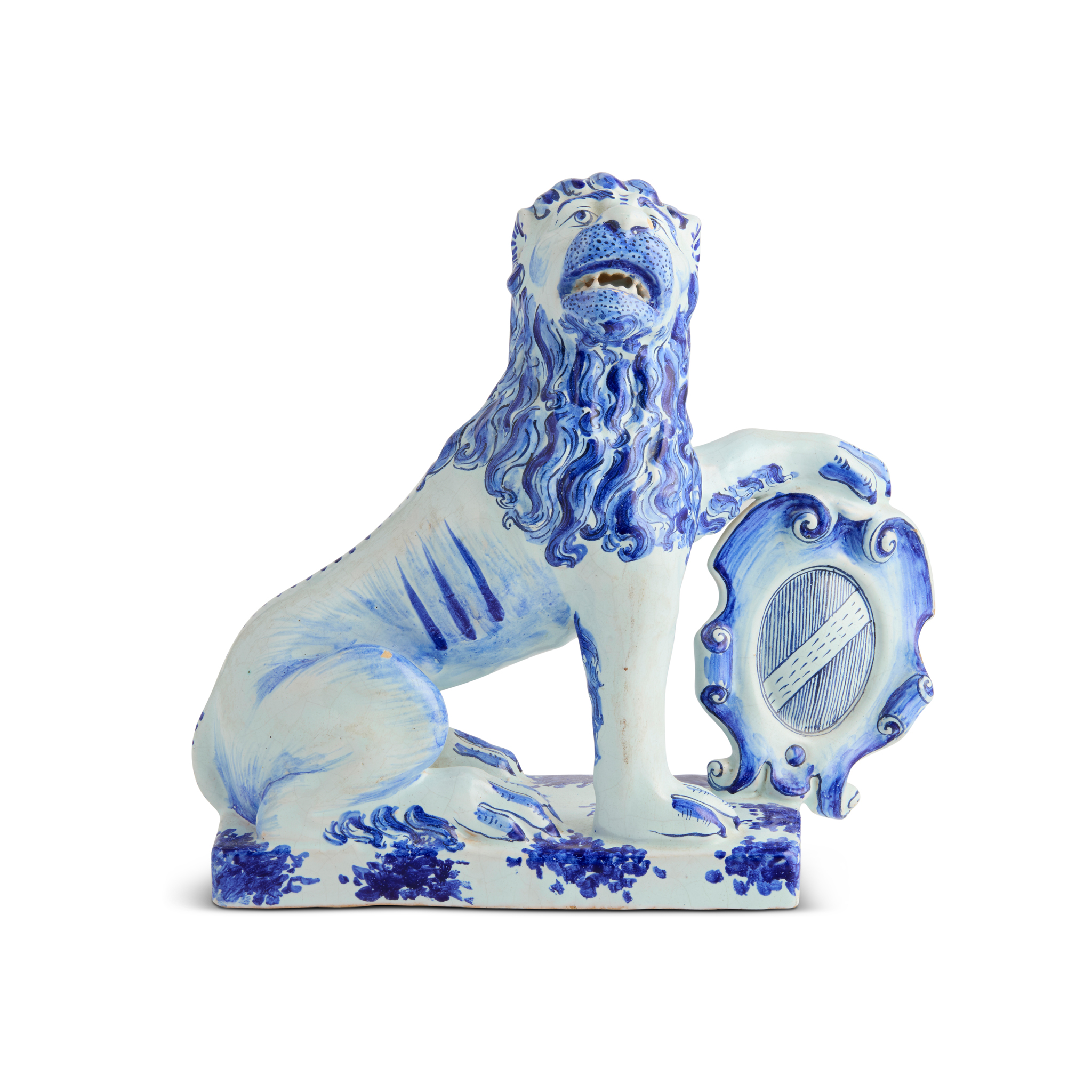 DUTCH DELFT BLUE AND WHITE ARMORIAL MODEL OF A LION