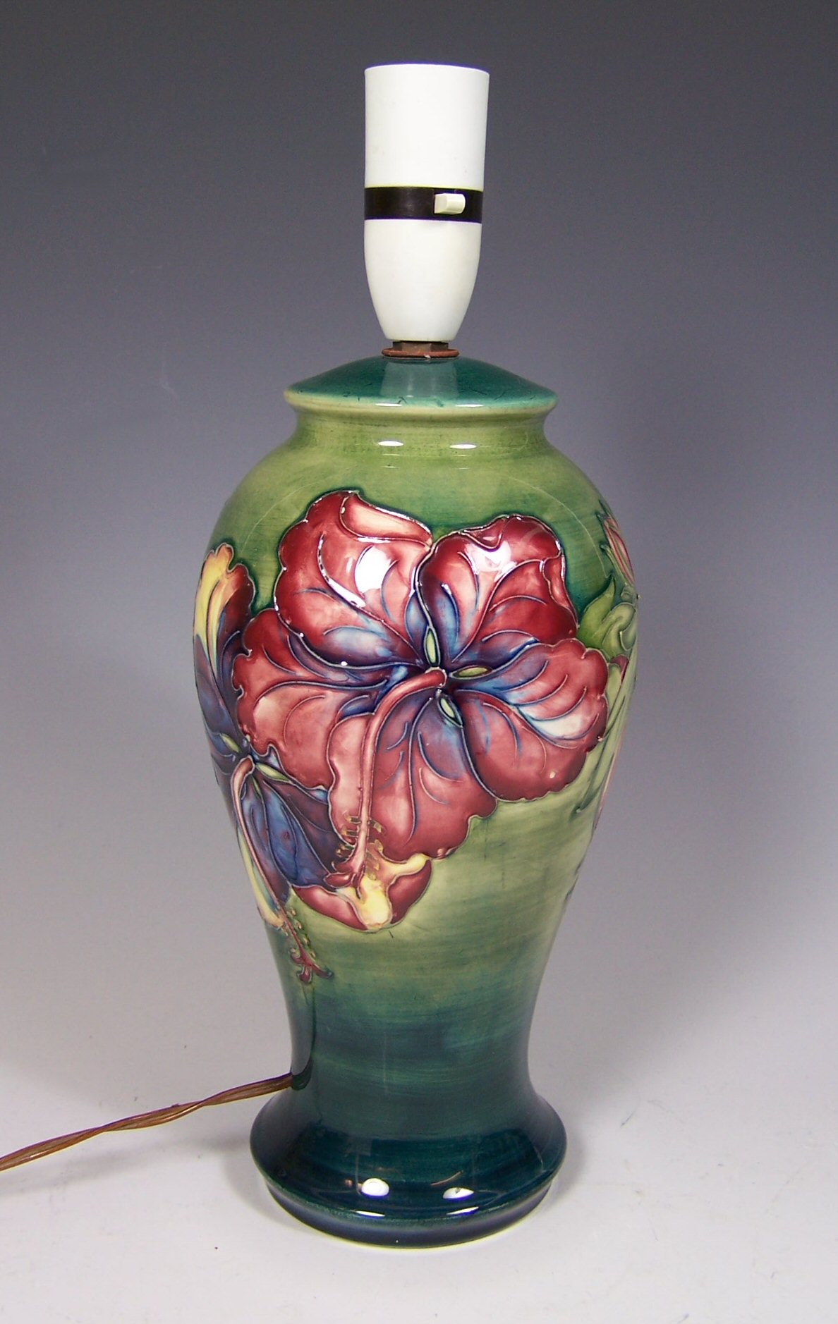 A Moorcroft 'hibiscus' pattern lamp base
