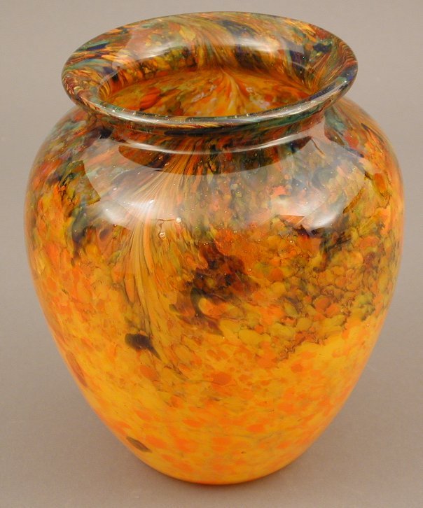 A Monart ovoid glass vase in mottled orange