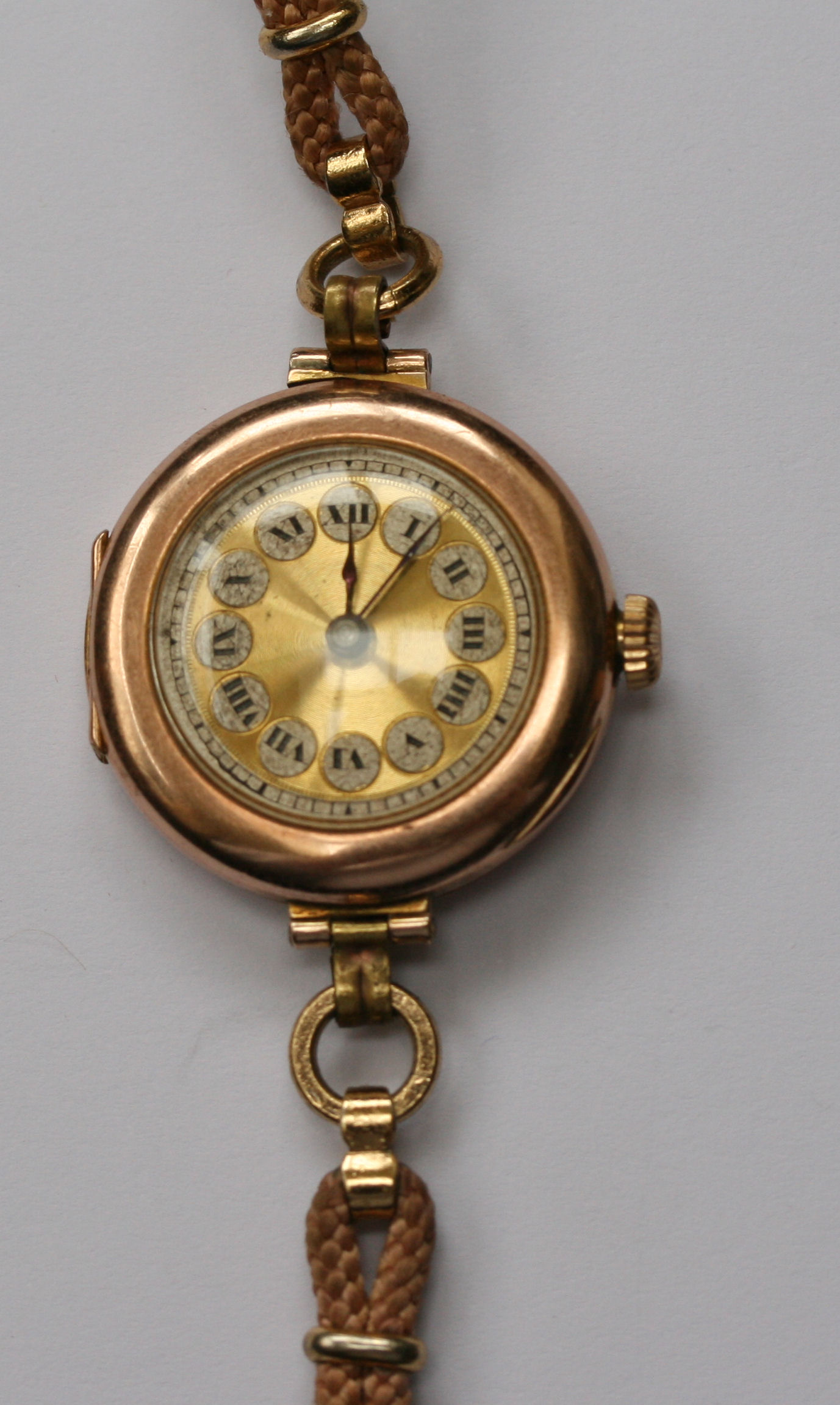 Rolex - a lady's gold cased wrist watch
