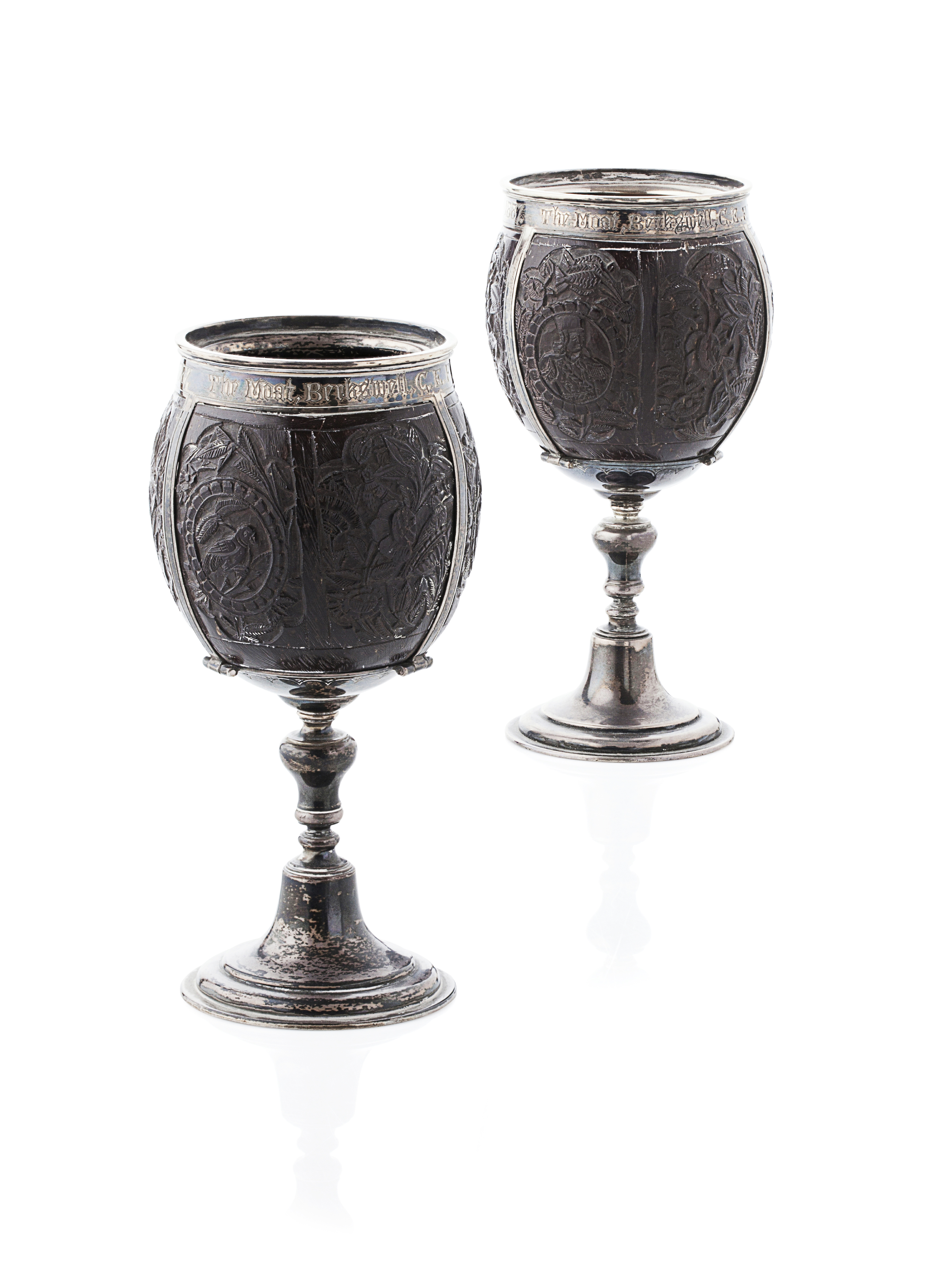A pair of late 19th century silver mounted coconut cups