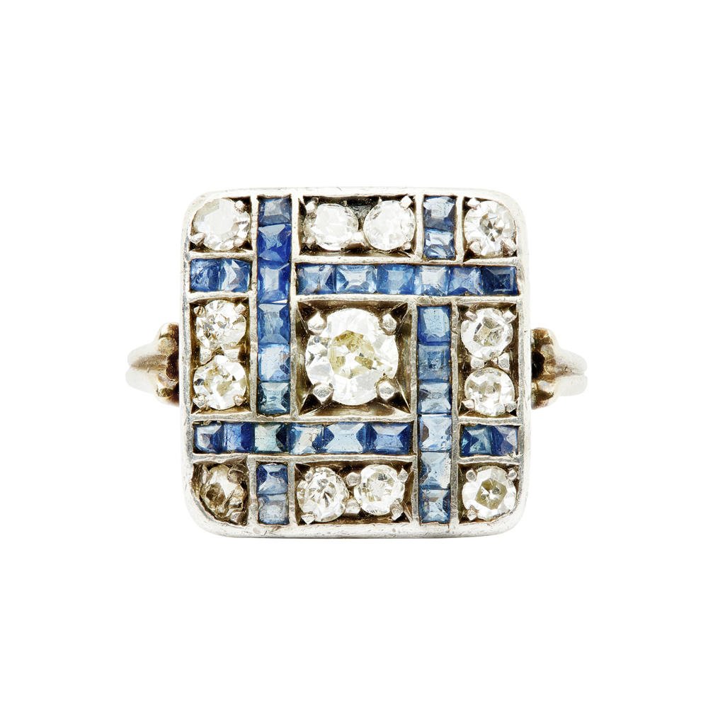 A sapphire and diamond set panel ring