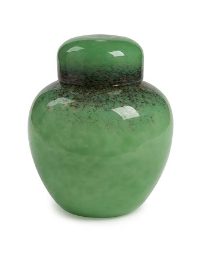 A Monart glass jar and cover,