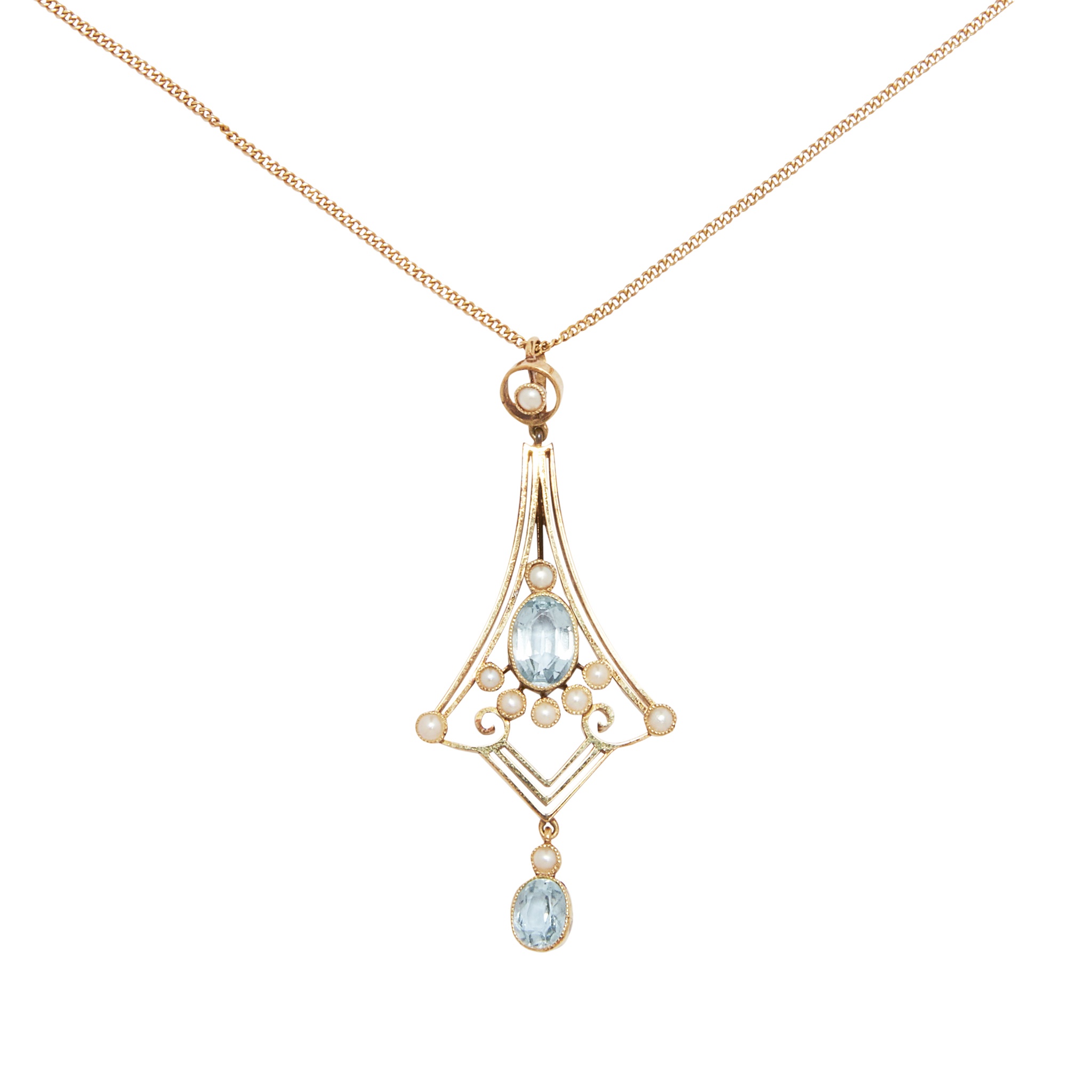 An early 20th century aquamarine and seed pearl set pendant