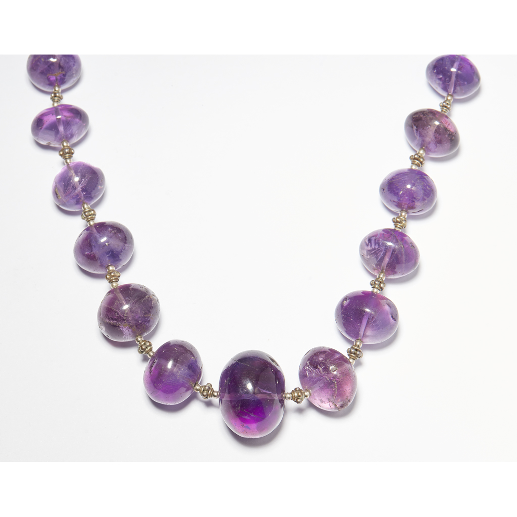 A large amethyst bead necklace