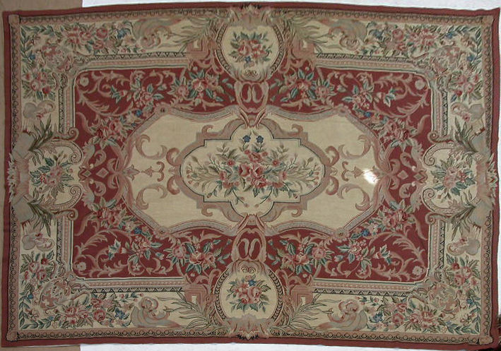 An Aubusson style needlepoint carpet