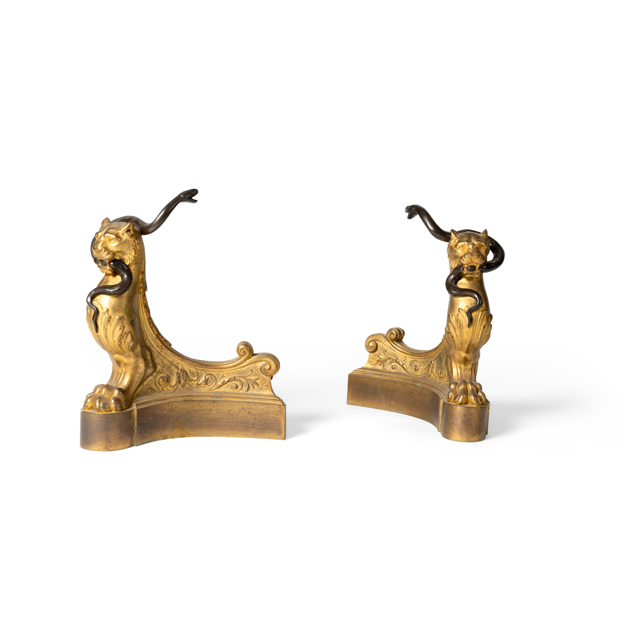 A PAIR OF GILT METAL AND BRONZE CHENET