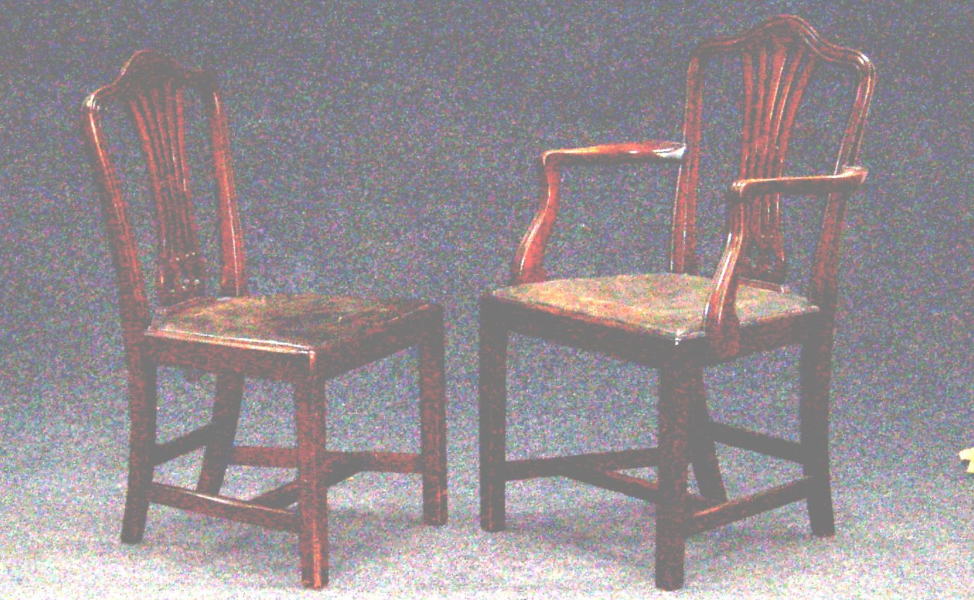 A set of six mahogany dining chairs, including two carvers,