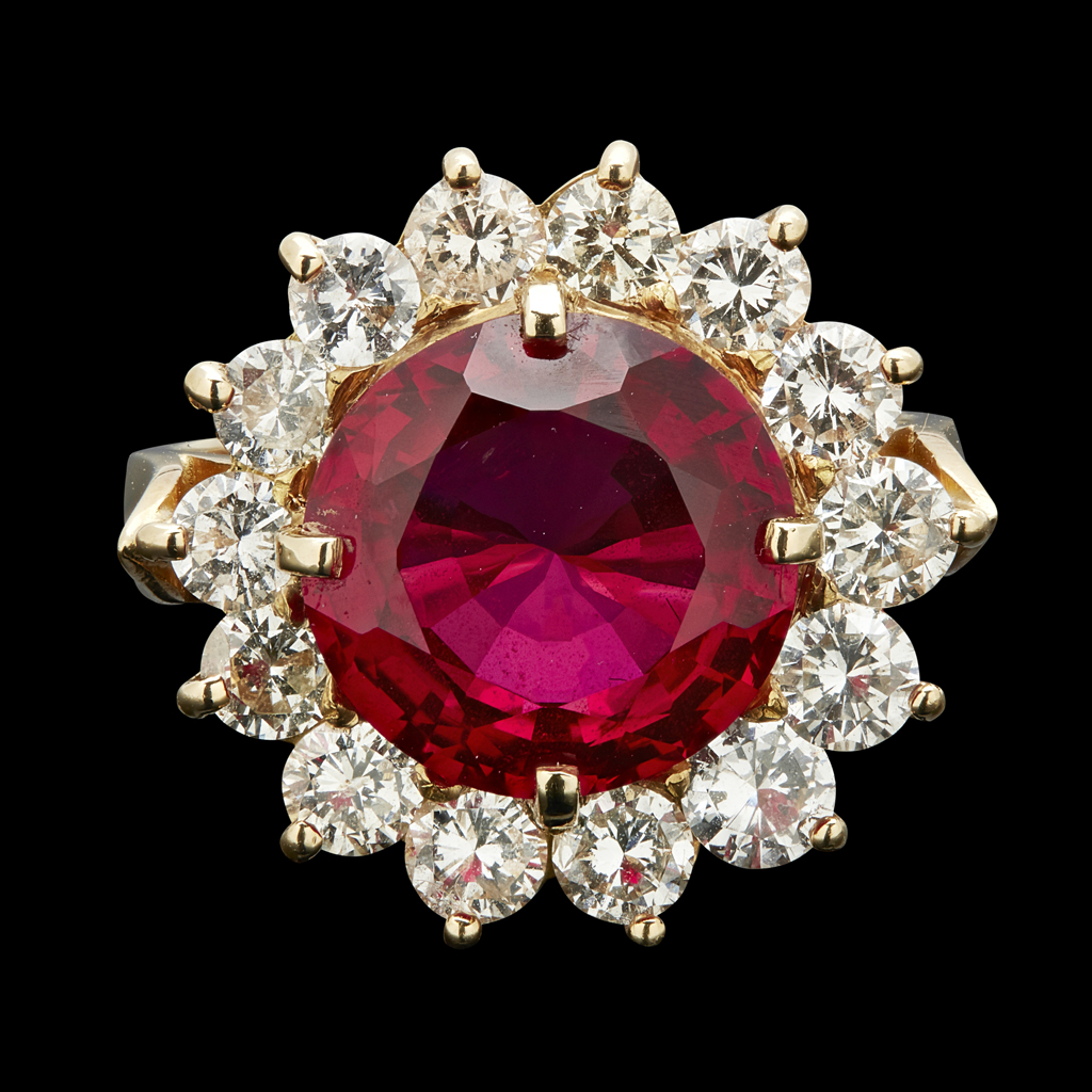 A ruby and diamond set cluster ring