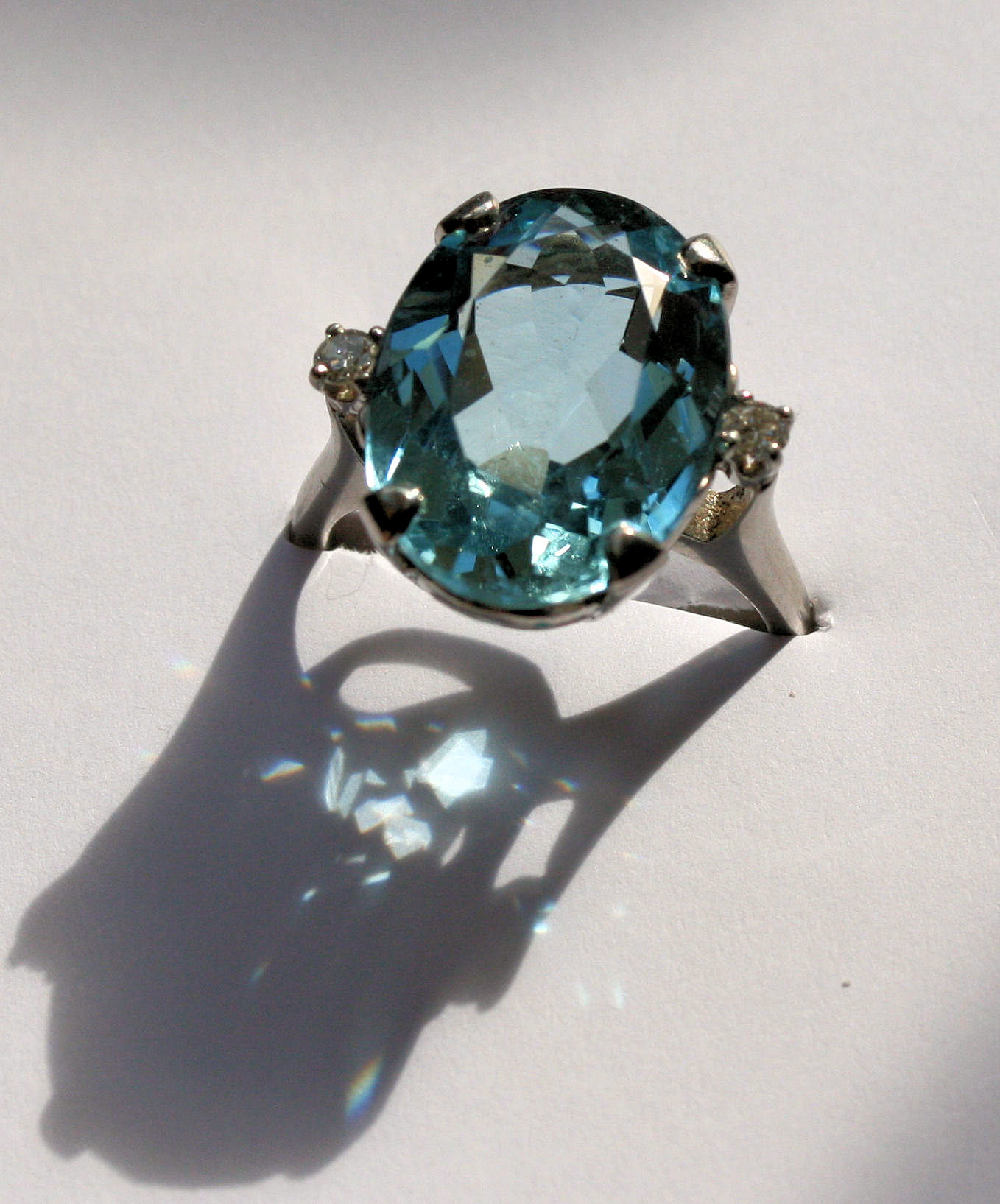 An aquamarine and diamond set cocktail ring