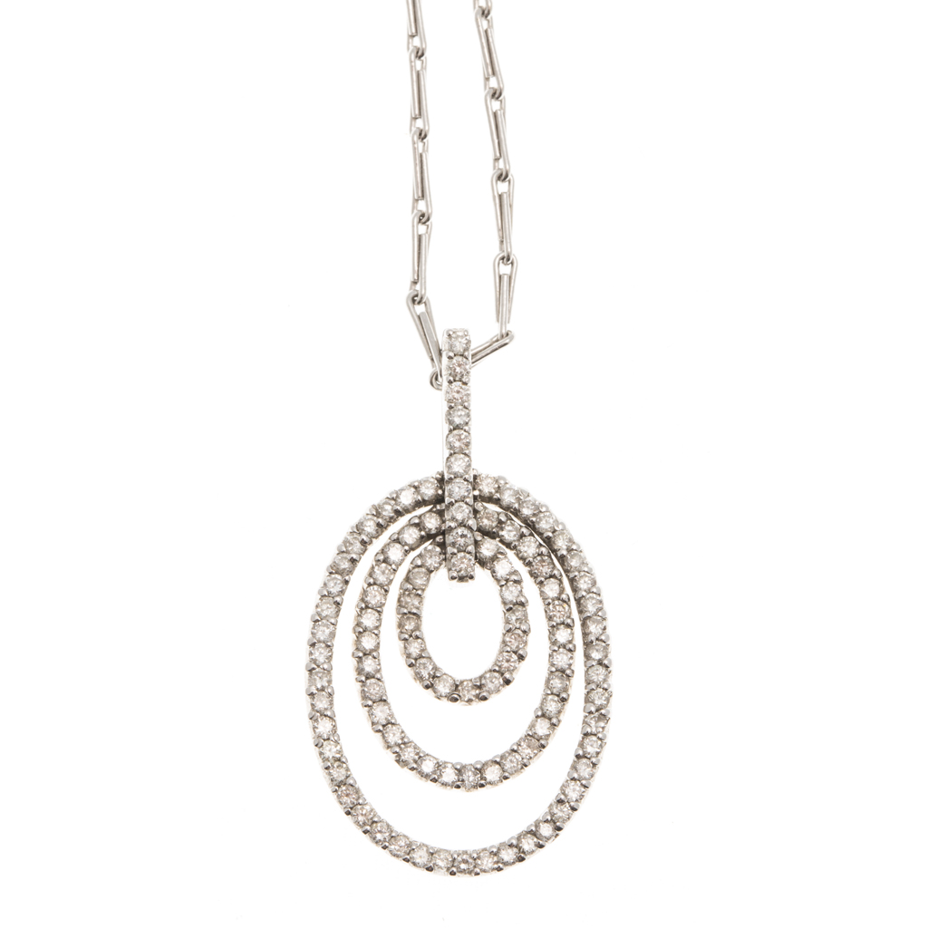 An 18ct white gold diamond set pendant