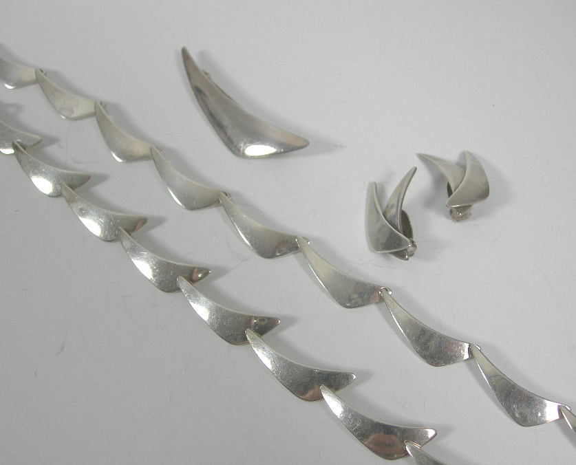 NIELS ERIK FROM - a 1960's silver necklace with matching bracelet, earrings and brooch,