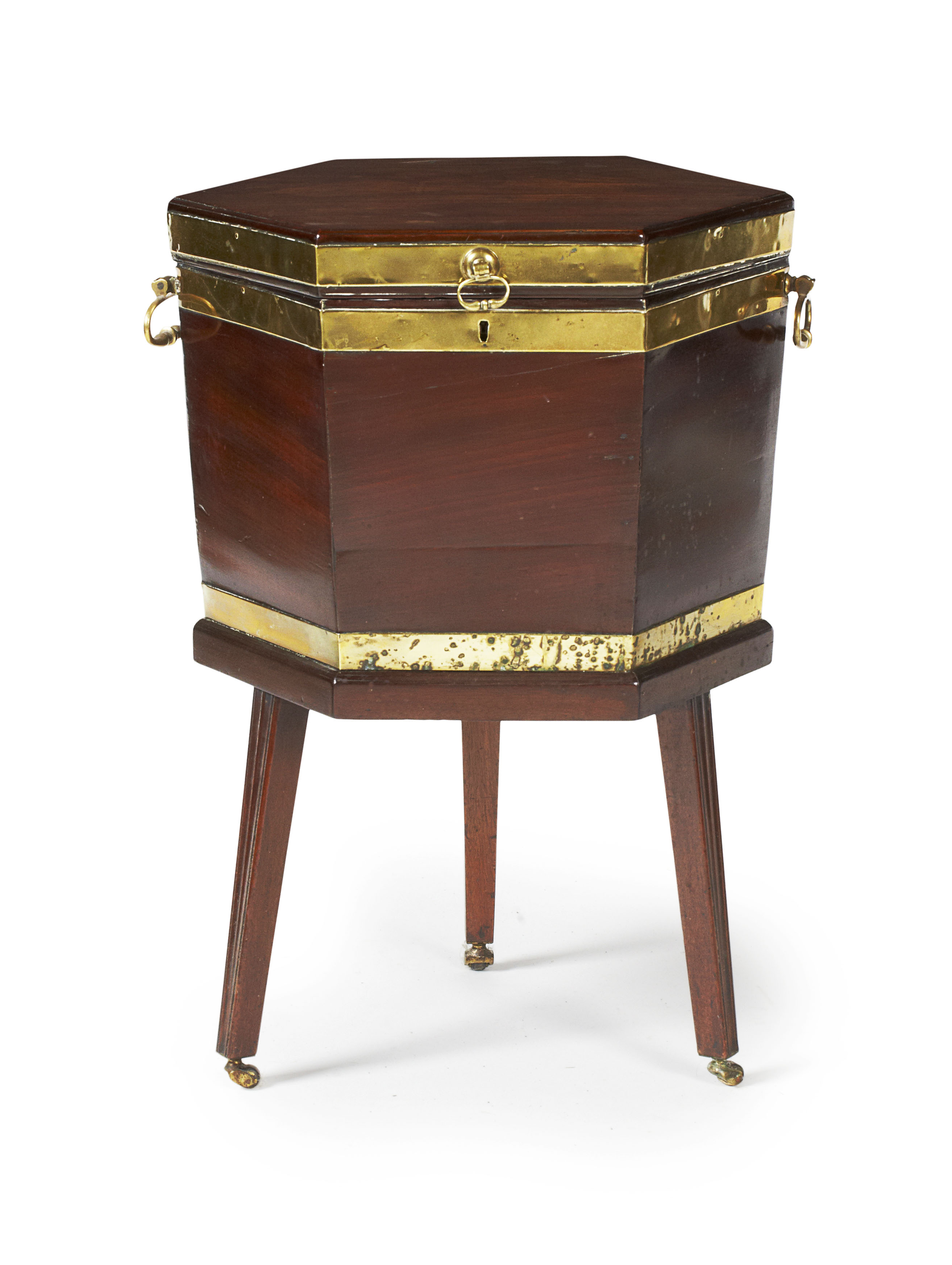 GEORGE III MAHOGANY AND BRASS BOUND HEXAGONAL CELLERETTE