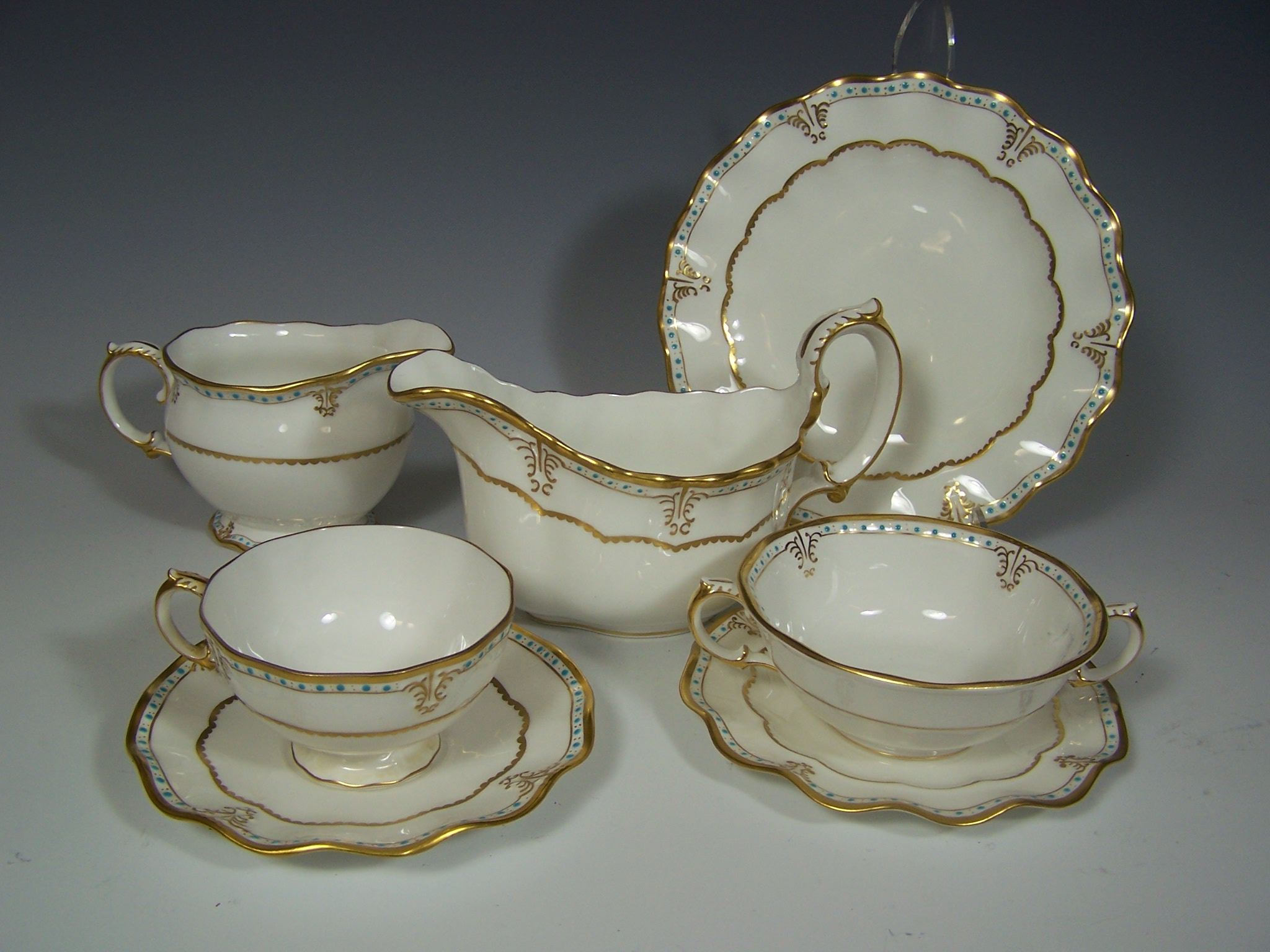 A large Royal Crown Derby Lombardy pattern dinner / tea service