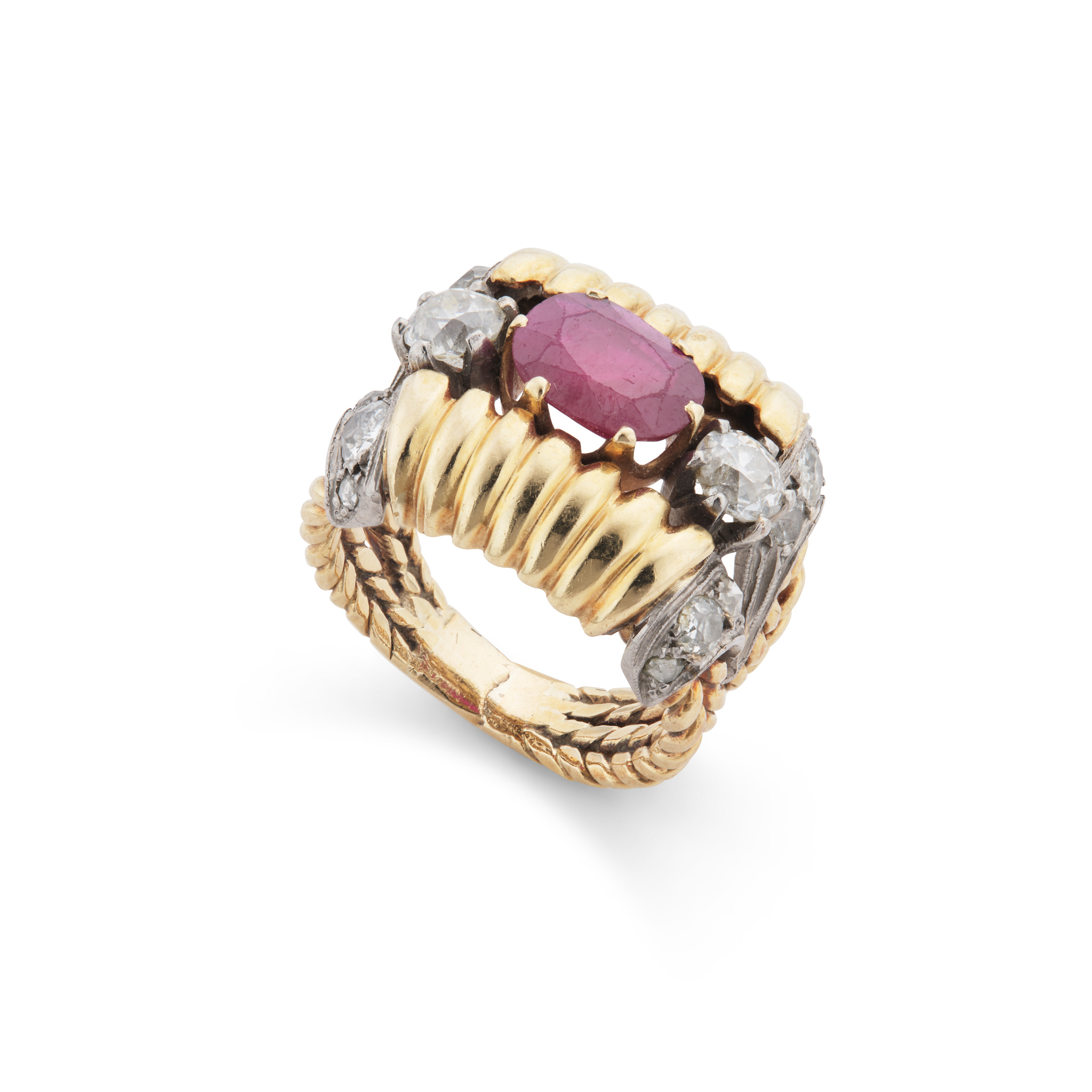 A mid 20th century ruby and diamond dress ring