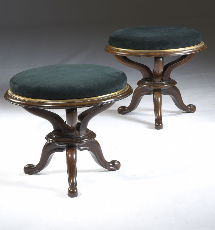 A pair of Victorian period rosewood and upholstered stools