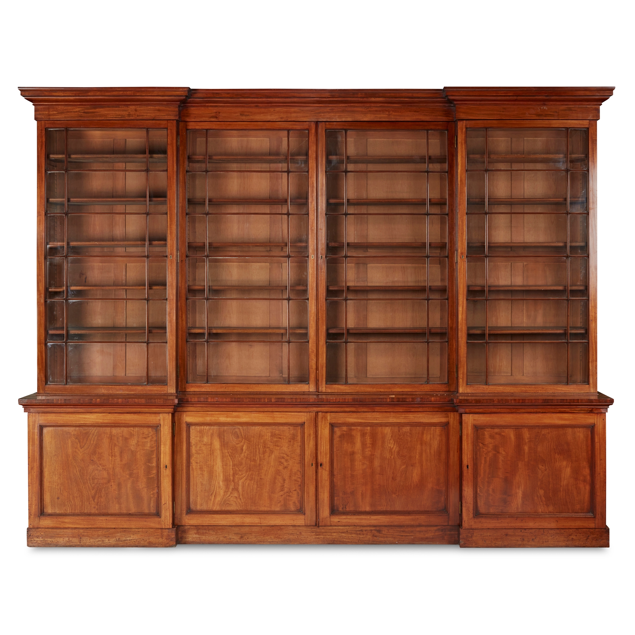 WILLIAM IV MAHOGANY INVERTED BREAKFRONT BOOKCASE
