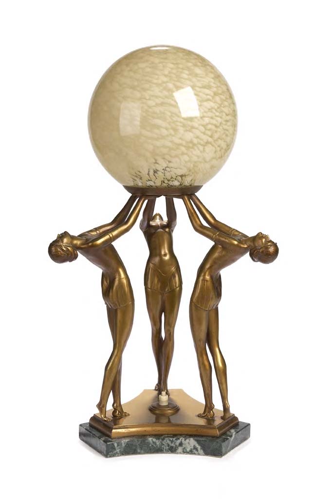 An Art Deco patinated spelter figural lamp,