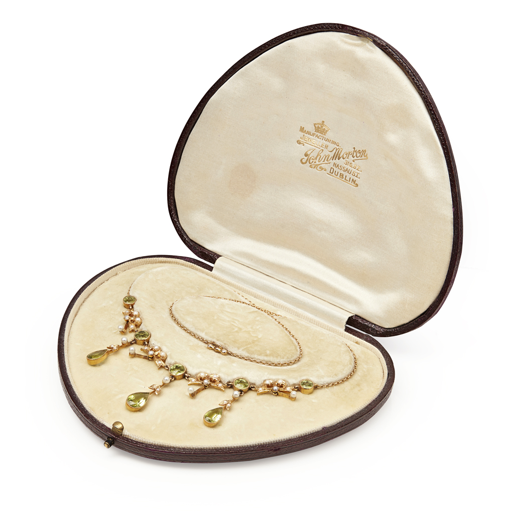 An early 20th century peridot and seed pearl set necklace