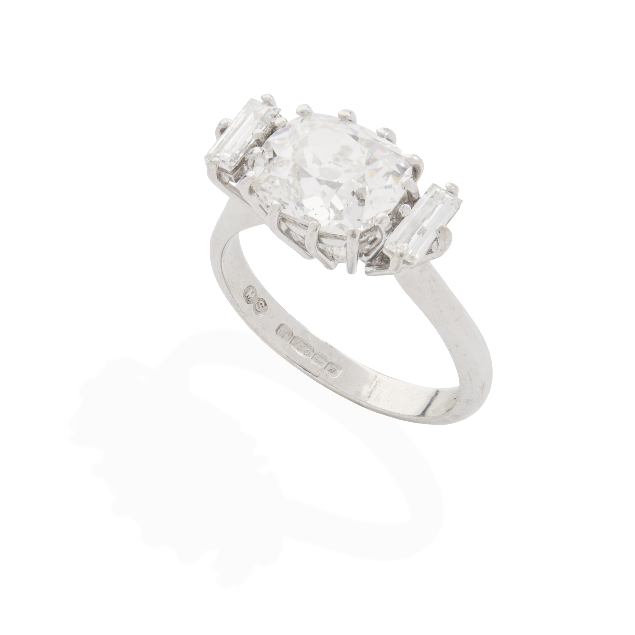 An 18ct white gold diamond three-stone ring