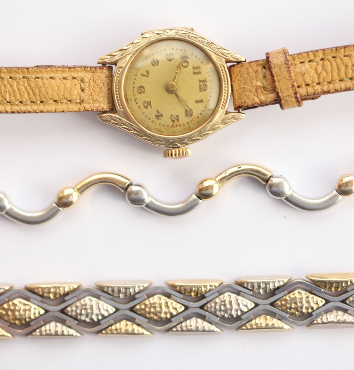 A three coloured gold bracelet