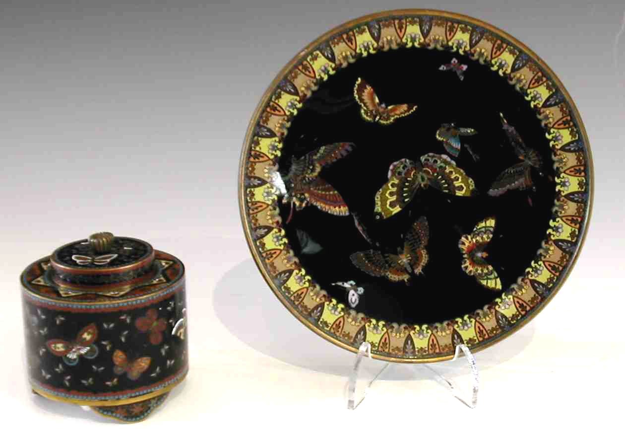 A Japanese cloisonne black ground cylindrical inkwell and cover, Meiji period,
