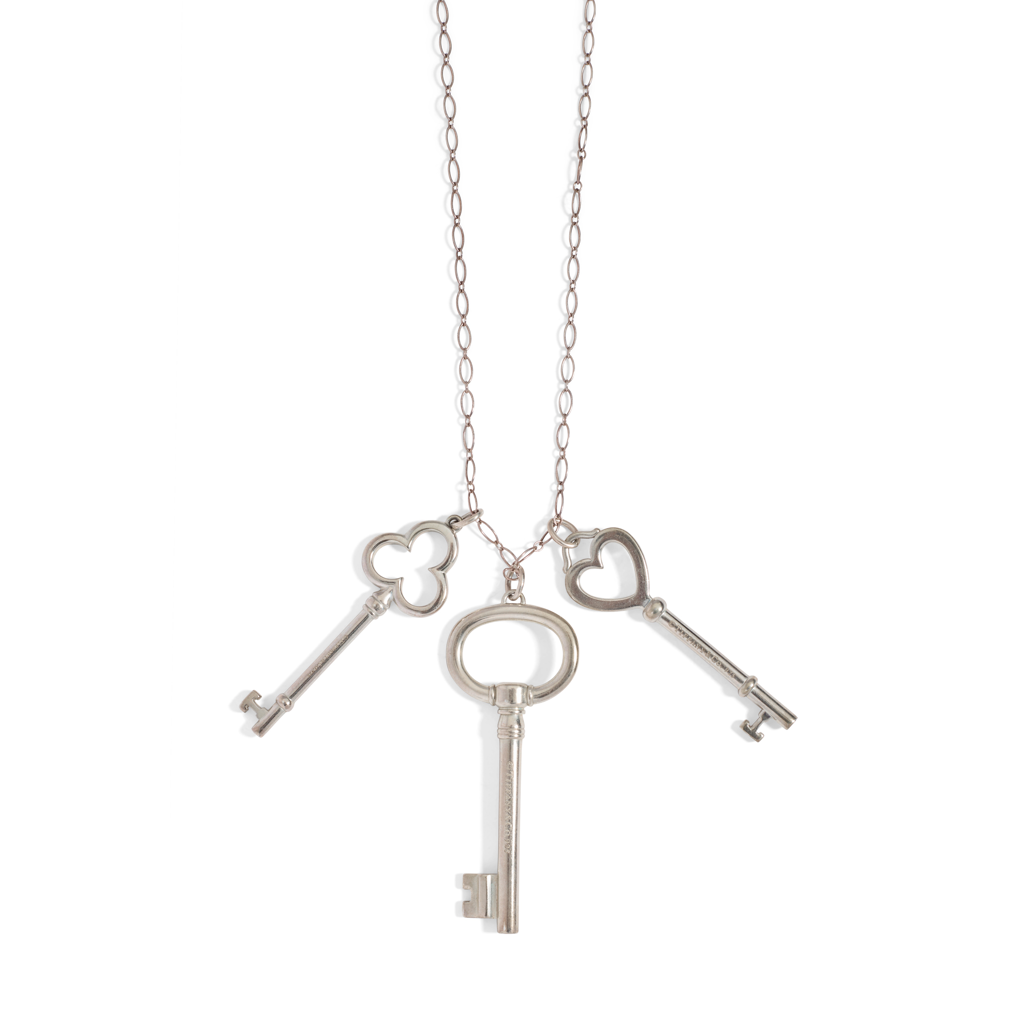 Tiffany & Co.: A silver key pendant necklace