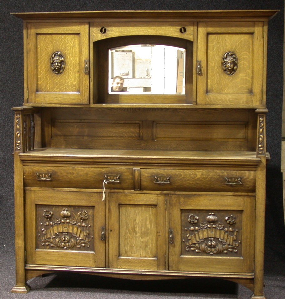 A Large Edwardian oak mirror back sideboard,