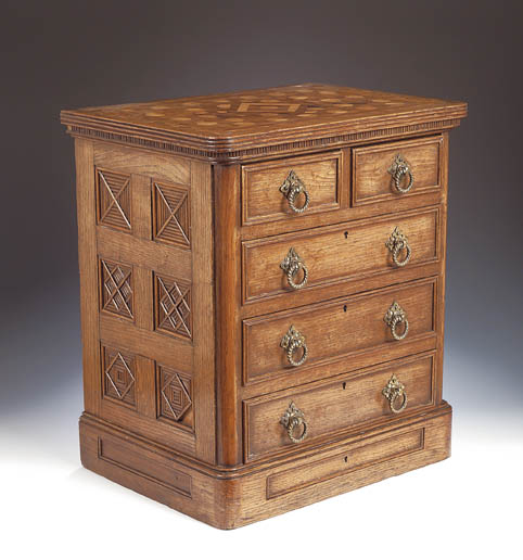 A 19th century oak table chest of drawers,