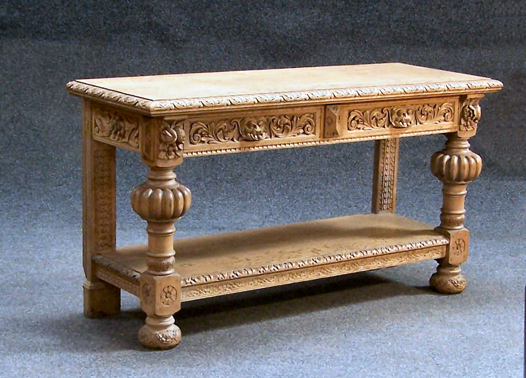 A Victorian carved oak serving table,