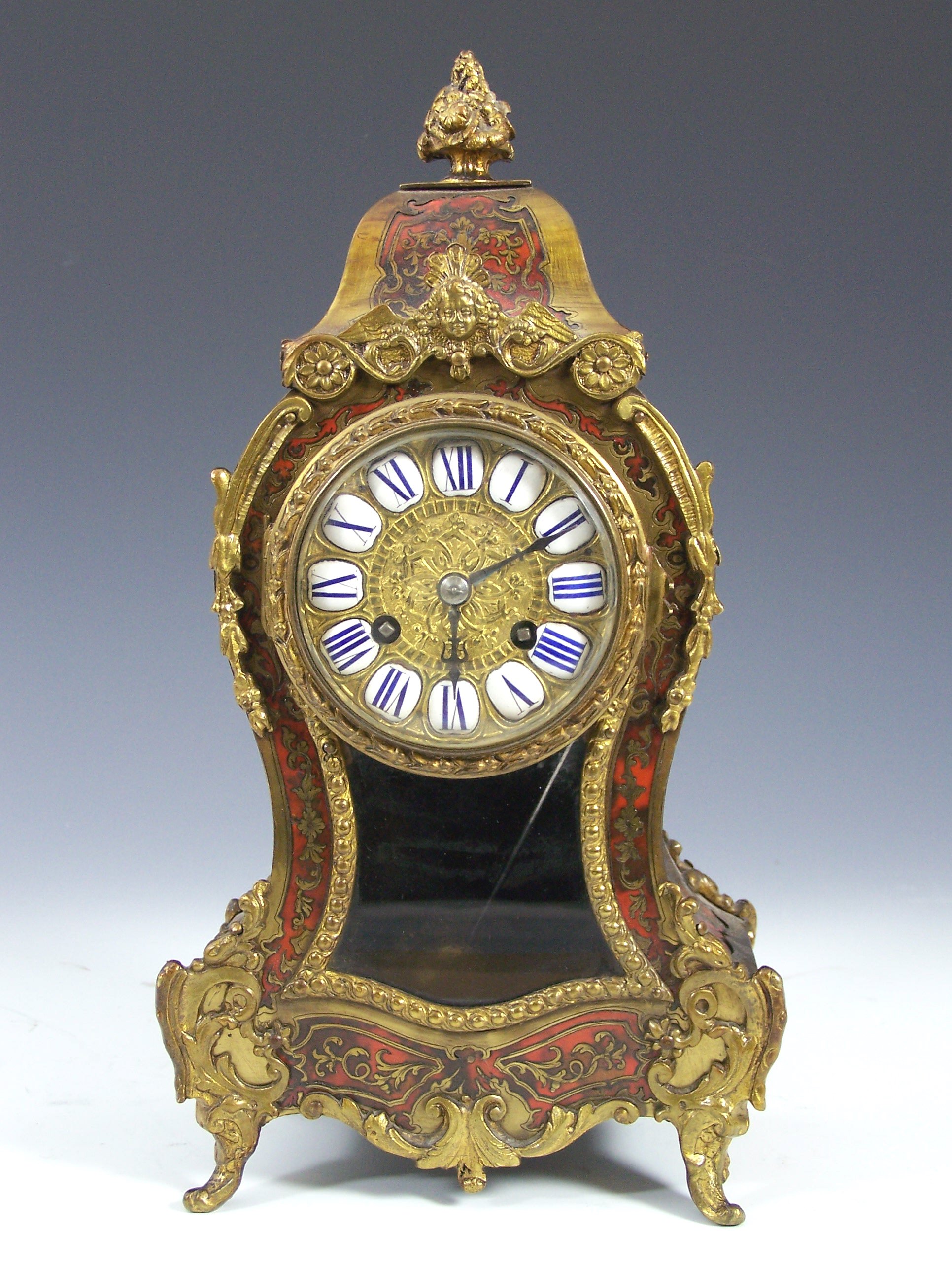 A Victorian boulle mantel clock,