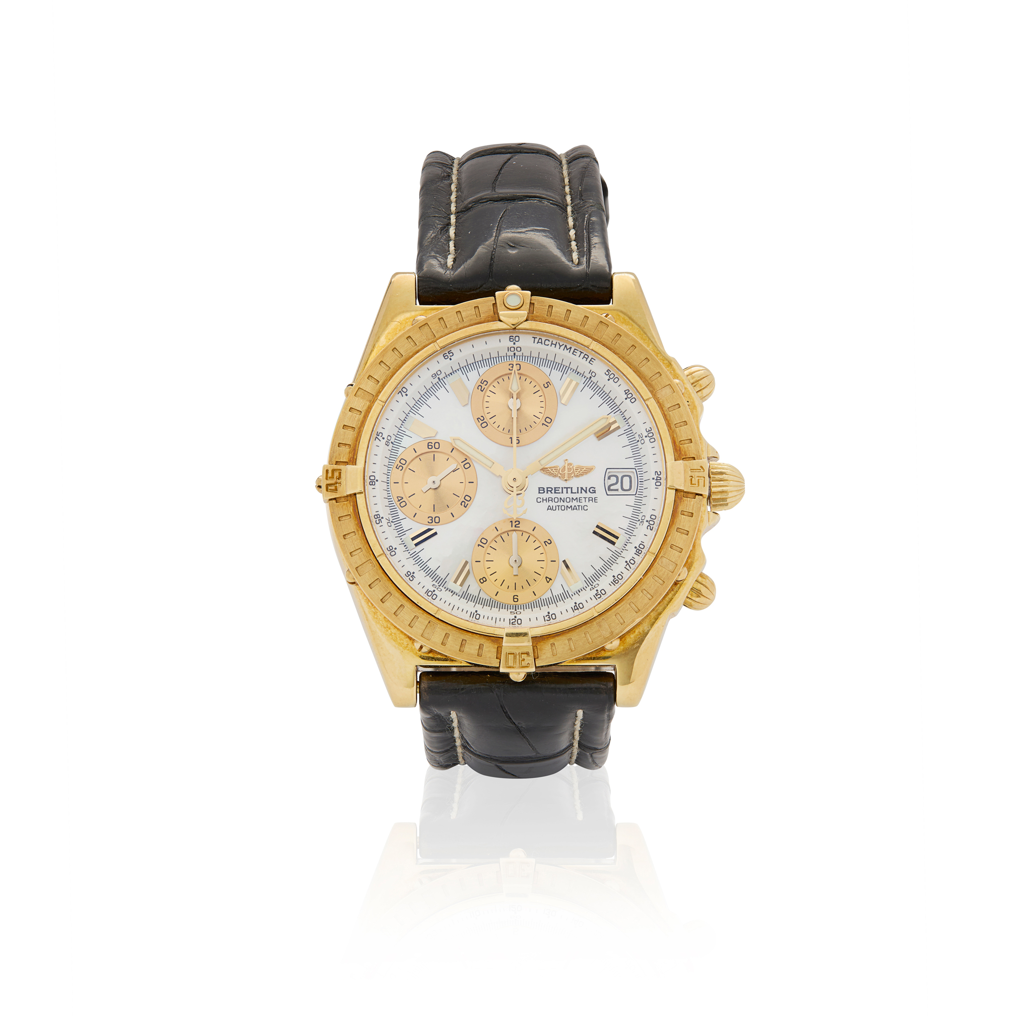 Breitling. An 18k gold automatic chronograph wristwatch with mother-of-pearl dial