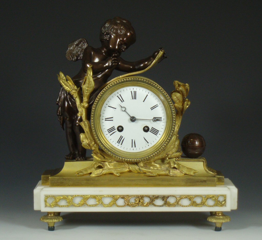 A French gilt metal mantel clock, circa 1870 In the Louis XVI style