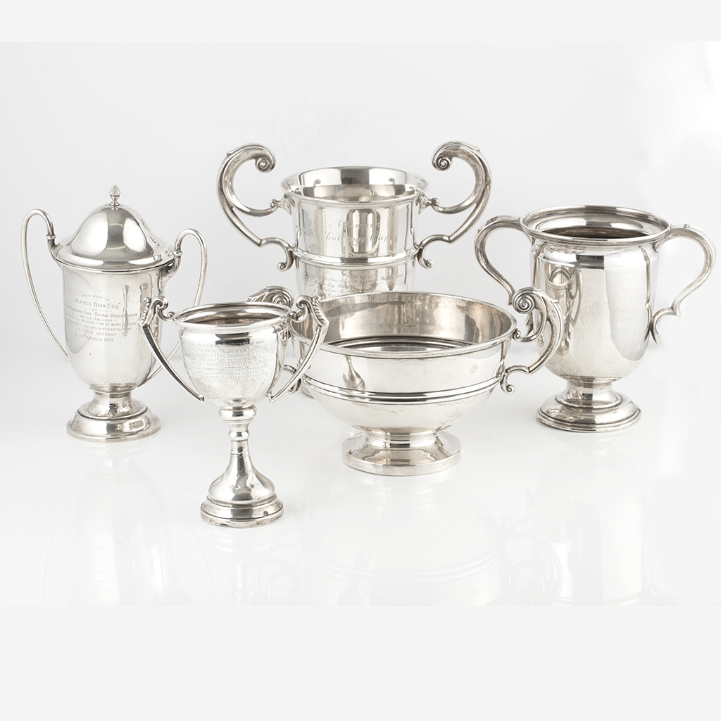 A collection of five silver trophies