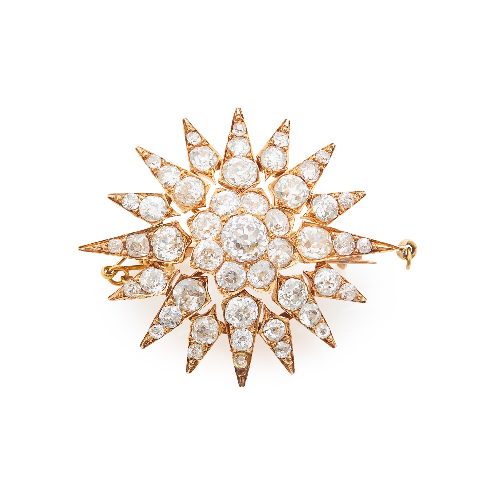 An eight diamond star brooch